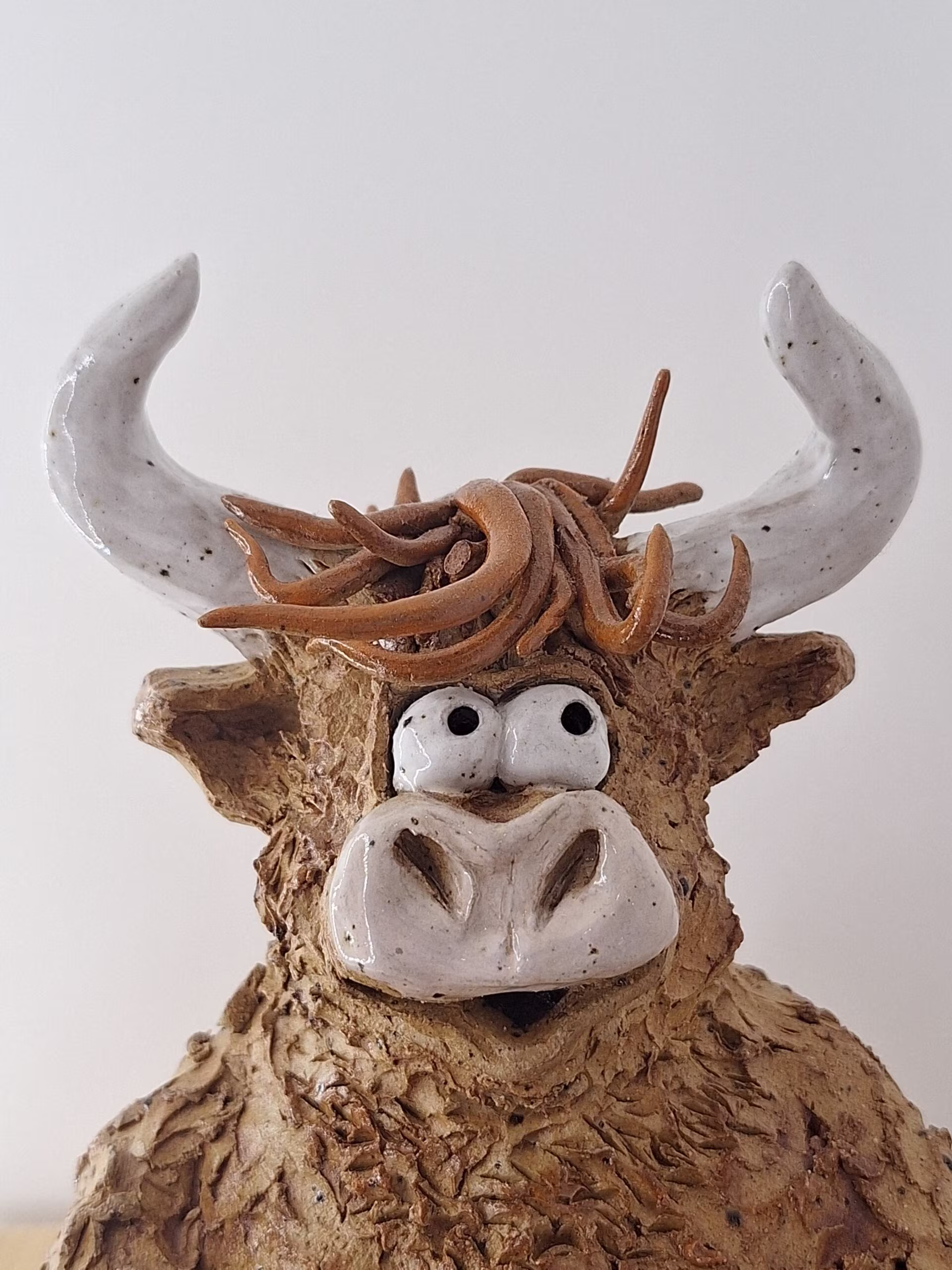 Handmade ceramic Highland Cow figurine — Hank by Henroo Pottery
