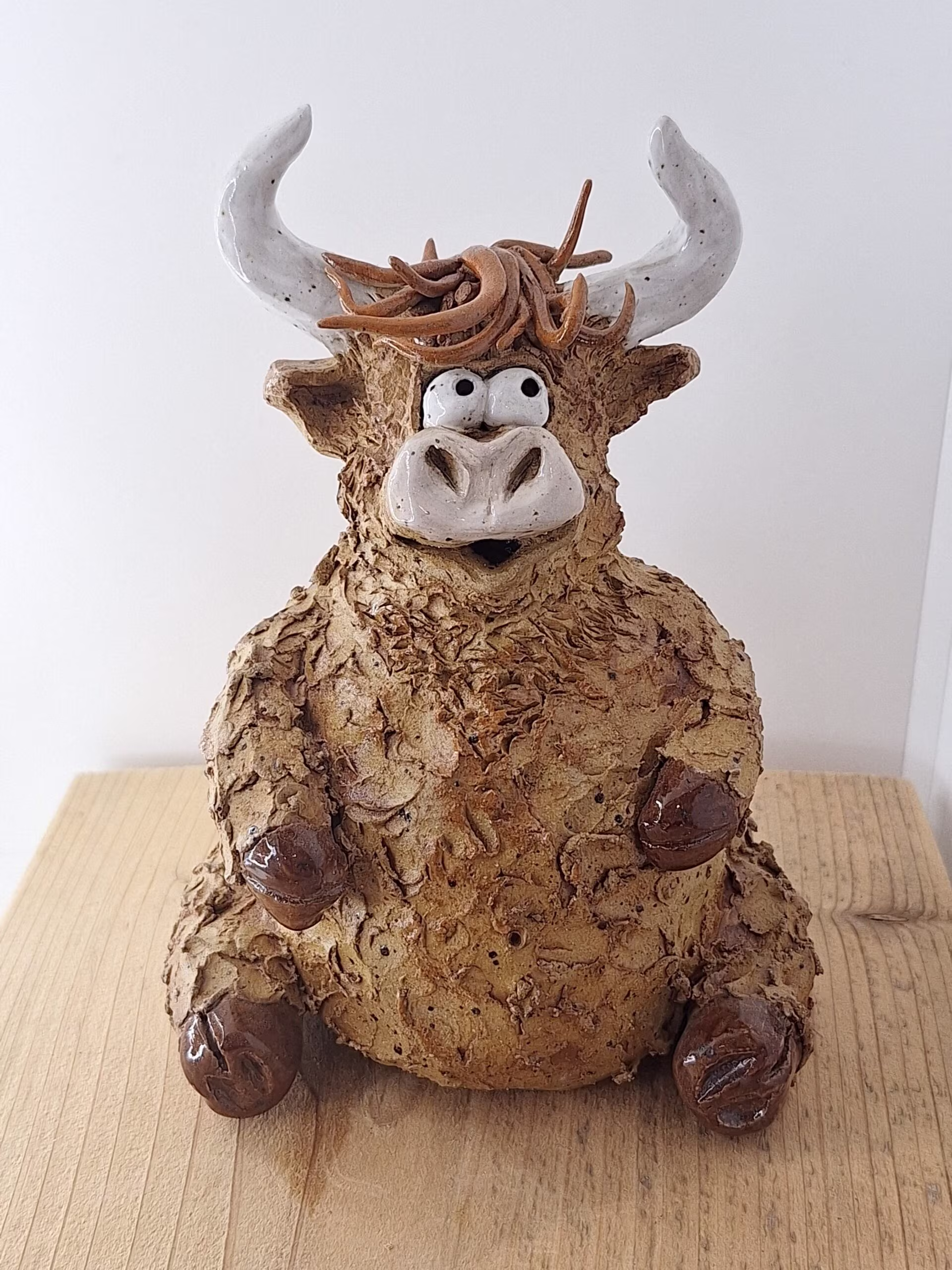 Handmade ceramic Highland Cow figurine — Hank by Henroo Pottery